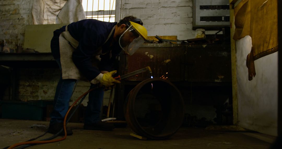 Factory Worker Manufacturing Industrial Metal Pipe with Blow Torch - Free Images, Stock Photos and Pictures on Pikwizard.com