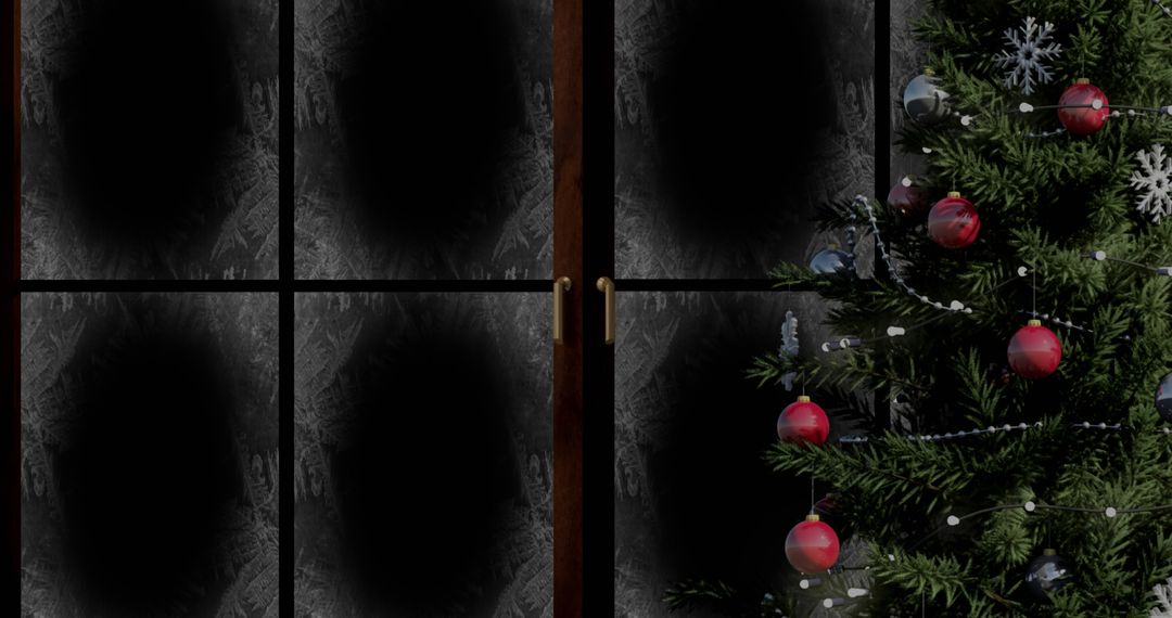 Snow Falling on Christmas Tree Outside Frosted Window