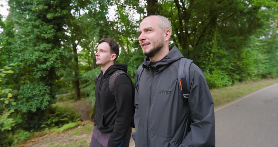 Friends Exploring Nature Together on a Scenic Walk