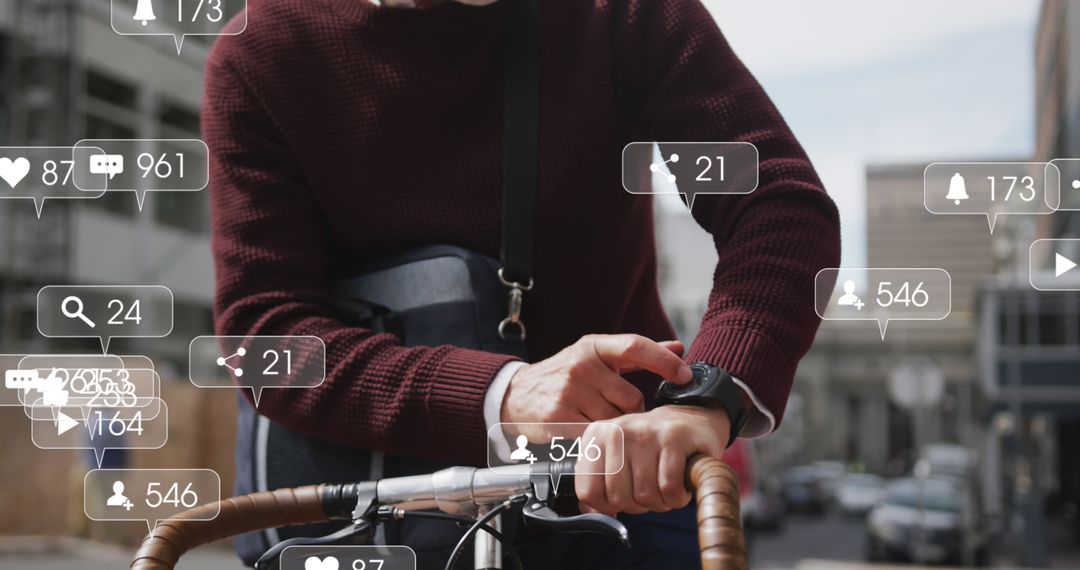 Man Checking Smartwatch on Bicycle with Social Media Notifications - Free Images, Stock Photos and Pictures on Pikwizard.com