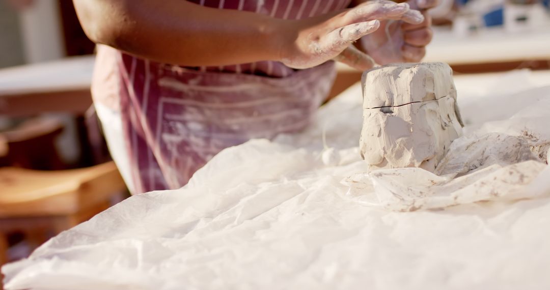 Person Sculpting Clay with Hands in Craft Studio - Free Images, Stock Photos and Pictures on Pikwizard.com