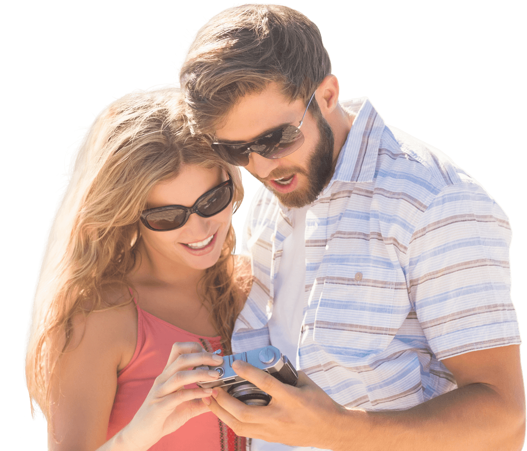 Smiling Couple Reviewing Photos on Camera Transparent Background