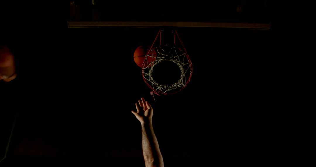 Basketball Player Shooting a Close-Up Shot - Free Images, Stock Photos and Pictures on Pikwizard.com