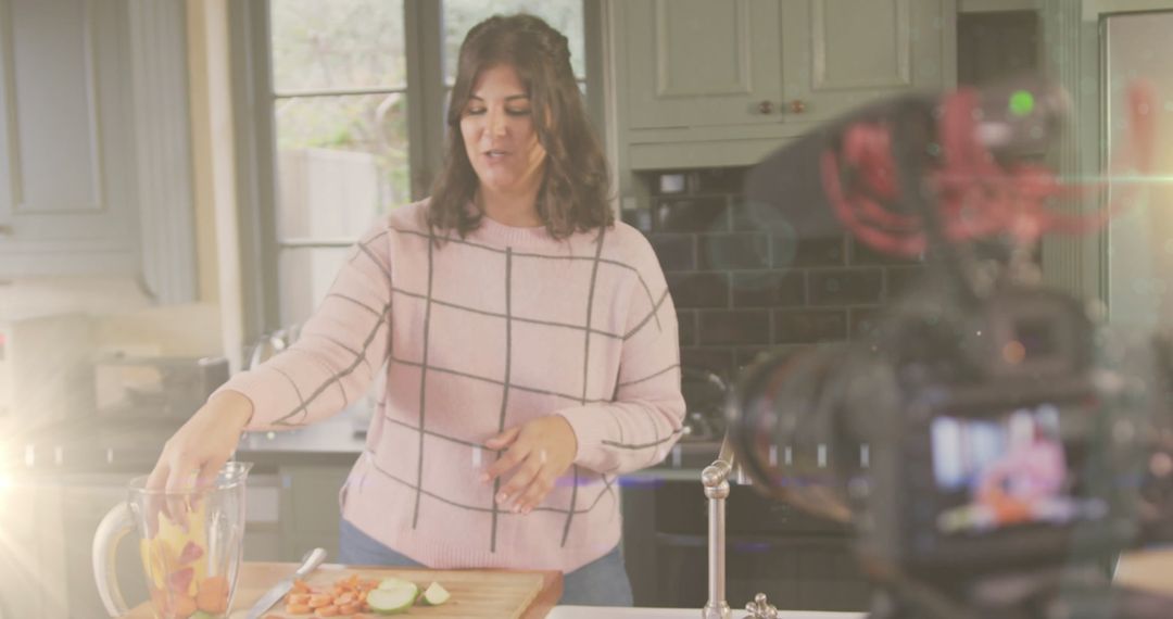 Female Vlogger Recording Cooking Tutorial at Home