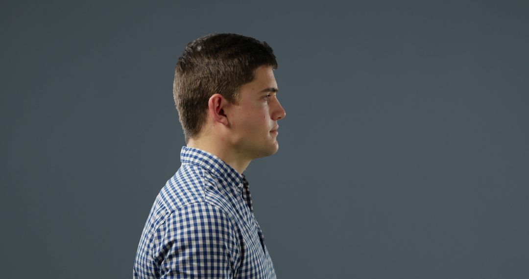 Young Man in Profile With Calm and Thoughtful Demeanor