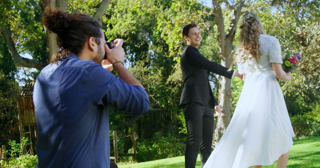 Professional Photographer Capturing Outdoor Wedding Moments - Free Images, Stock Photos and Pictures on Pikwizard.com