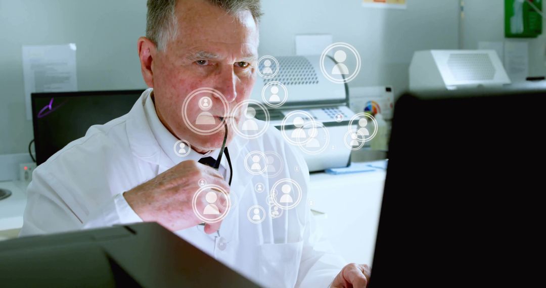 Senior Doctor Analyzing Digital Data with Stethoscope in Laboratory