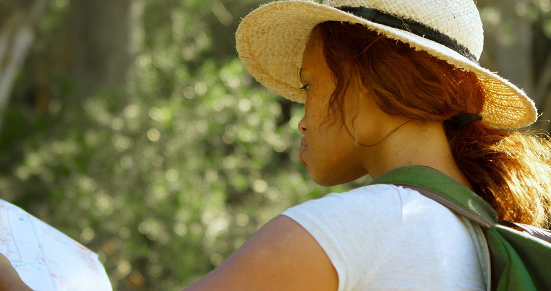 Woman Navigating Trail with Map on Adventure Hike