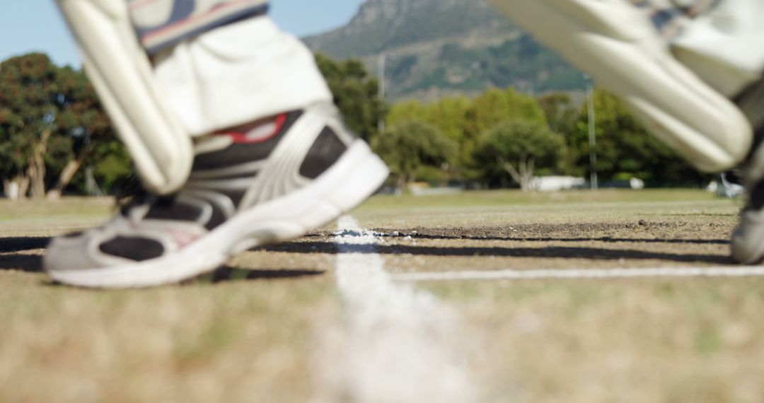 Close-Up of Cricketer's Shoes Positioned on Crease in Cricket Match - Free Images, Stock Photos and Pictures on Pikwizard.com