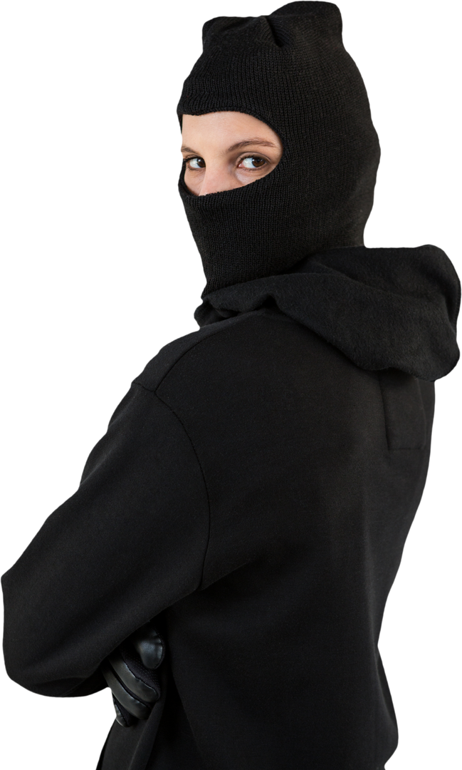 Female hacker standing in black hoodie and balaclava looking ominous - Download Free Stock Images Pikwizard.com