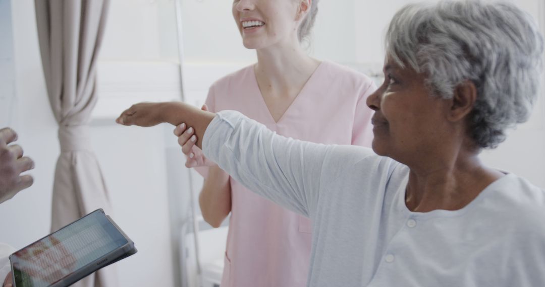 Elderly Woman Receiving Physical Therapy from Caregiver - Free Images, Stock Photos and Pictures on Pikwizard.com