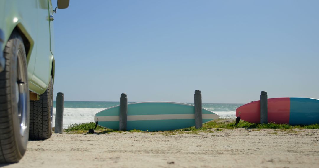 Surfboards Resting on Beach Next to Retro Camper Van - Free Images, Stock Photos and Pictures on Pikwizard.com