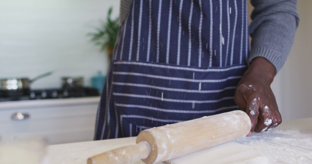 Man Preparing Dough with Rolling Pin in Kitchen - Free Images, Stock Photos and Pictures on Pikwizard.com