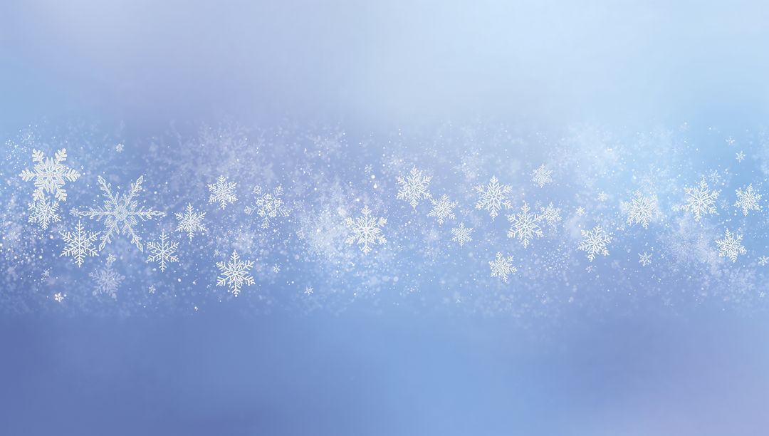 Drifting Snowflakes Sparkling Over Frosted Blue Bokeh Background With Soft Glitter Haze