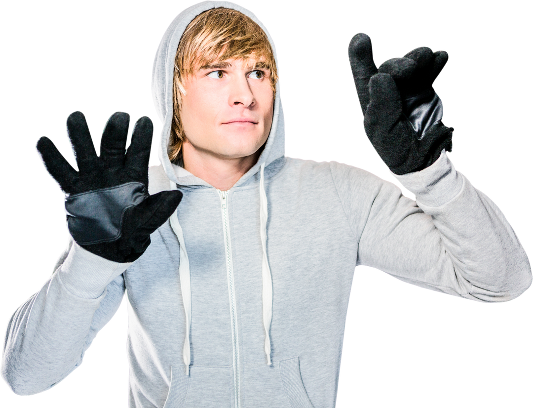 Young Man in Hoodie with Black Gloves Hitting Transparent Surface - Download Free Stock Images Pikwizard.com