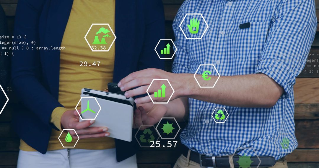 Ecology Icons Over Colleagues Using Tablet in Modern Office
