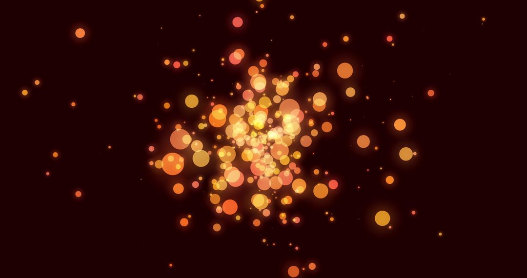 Glowing Orange and Yellow Bokeh Circles on Dark Background