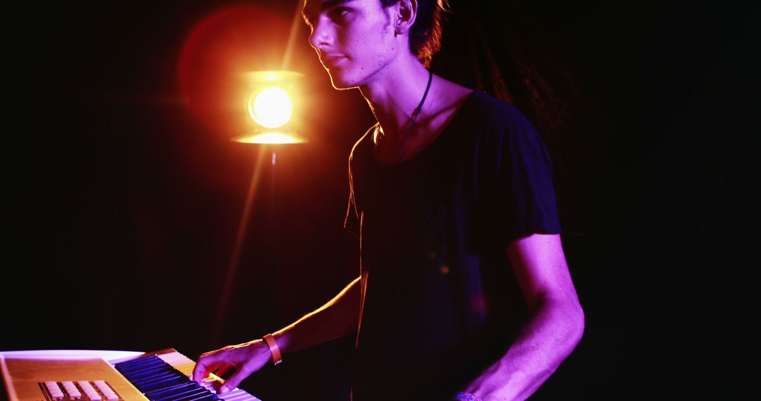 Young Musician Performing with Keyboard on Stage