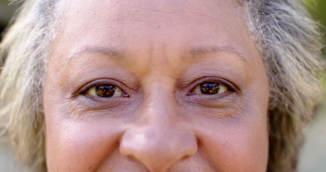 Close-Up of Joyful, Wise Senior Woman's Eyes