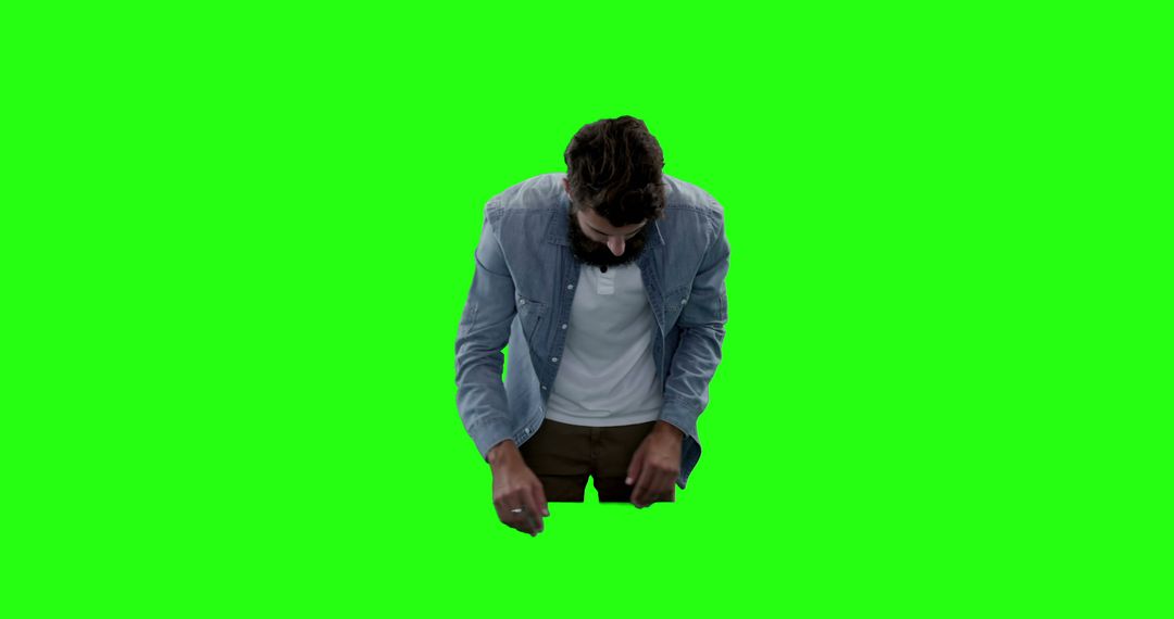 Man Looking Down Isolated by Green Screen - Free Images, Stock Photos and Pictures on Pikwizard.com