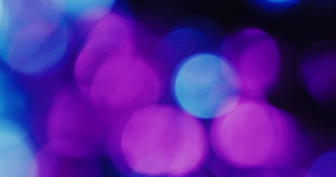 Vibrant Abstract Bokeh Circles in Purple and Blue Hues