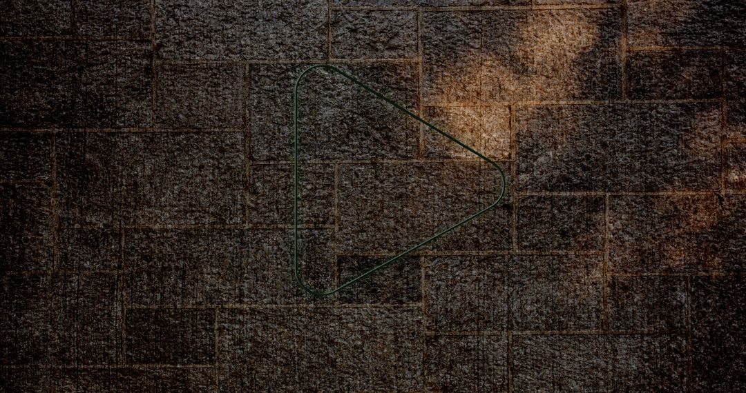 Grunge-Inspired Play Button on Textured Wall Background