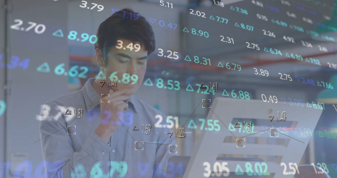 Businessman Analyzing Digital Financial Data on Transparent Screen