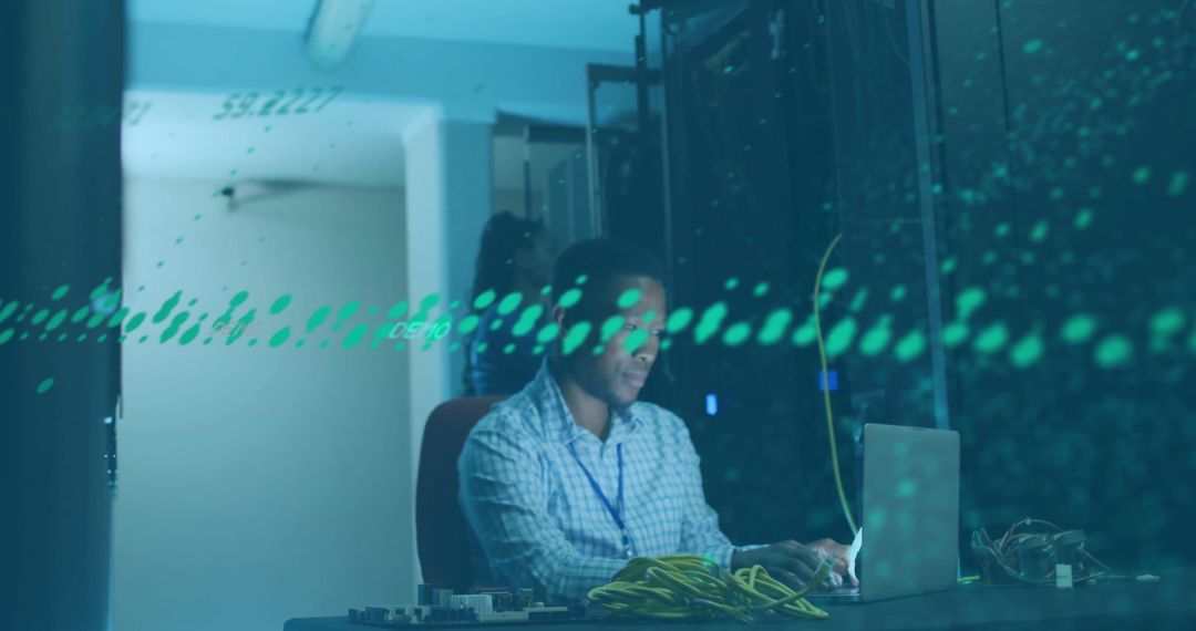 Tech Professional Analyzing Data Streams in Server Room