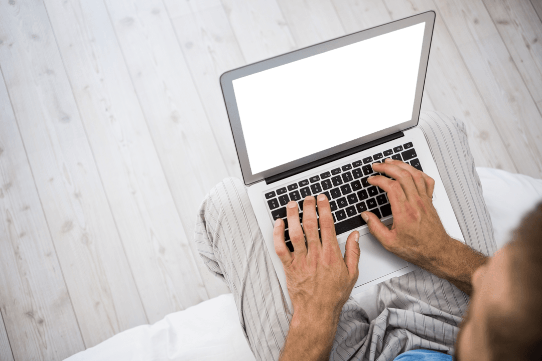 Overhead View of Person Typing on Laptop with Transparent Screen