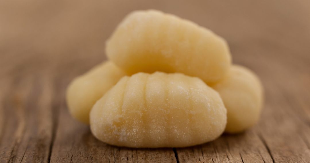 Close-Up of Fresh Raw Gnocchi on Rustic Wooden Table