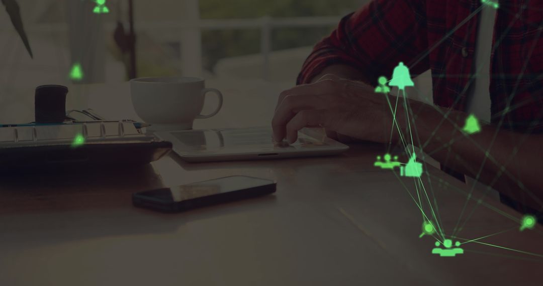 Man Engaging with Digital Network on Tablet at Home Office