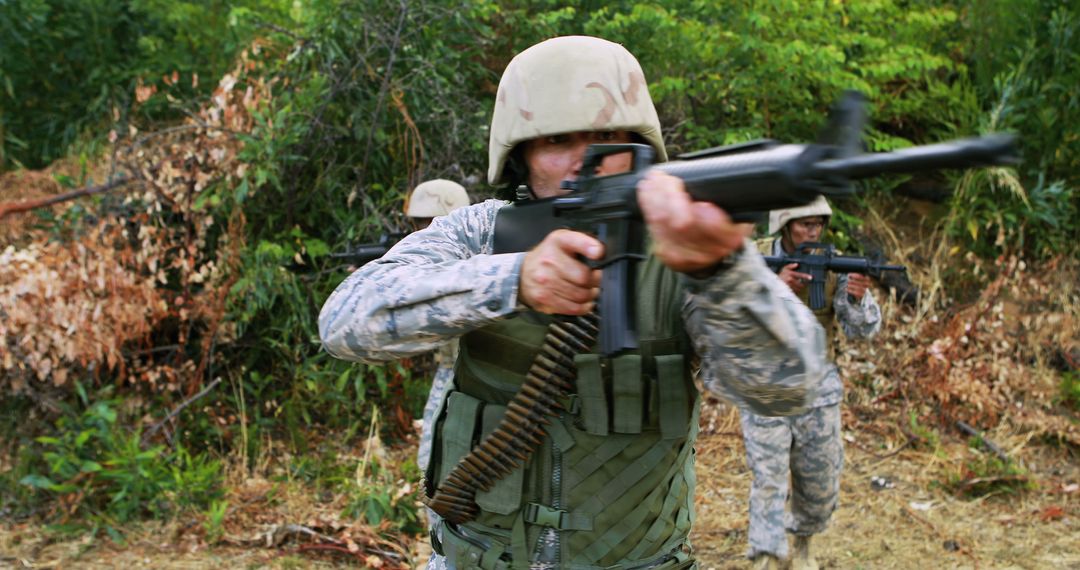 Soldiers in Combat Training with Rifles in Forested Area - Free Images, Stock Photos and Pictures on Pikwizard.com