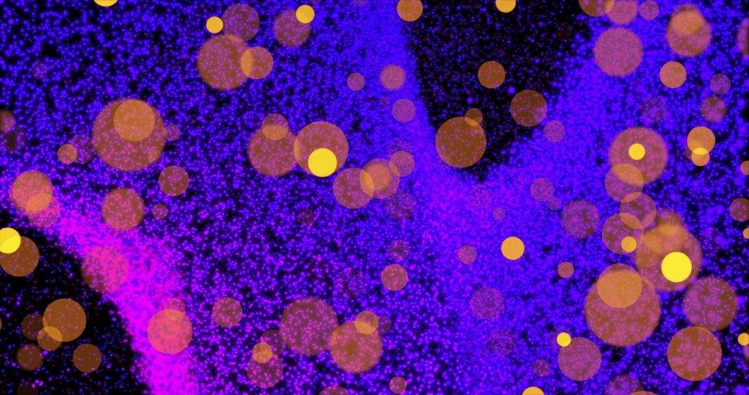 Colorful Particles and Glowing Circles on Dark Background