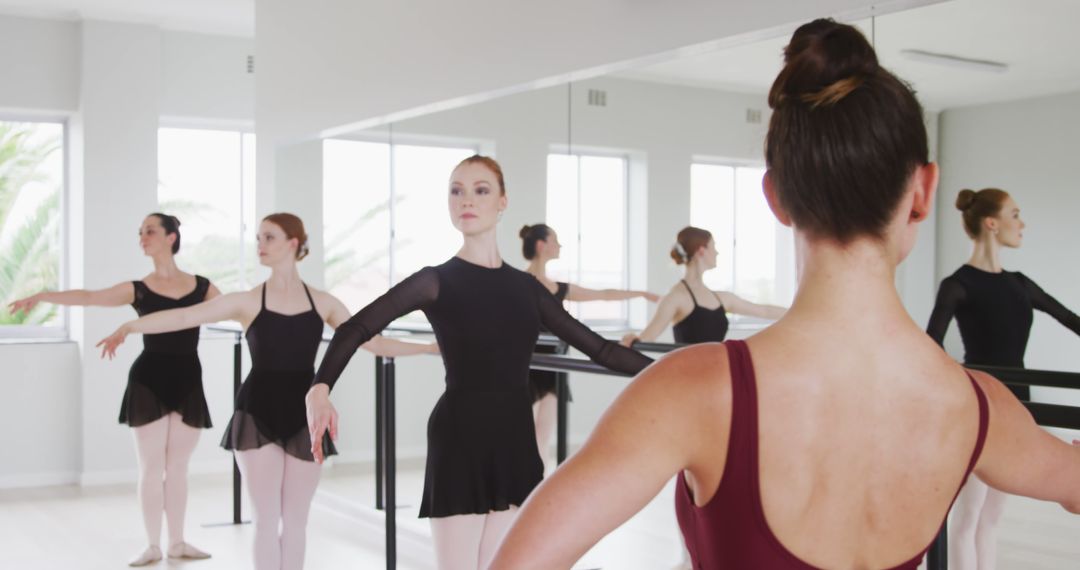 Ballet Class Training with Female Instructor in Dance Studio - Free Images, Stock Photos and Pictures on Pikwizard.com