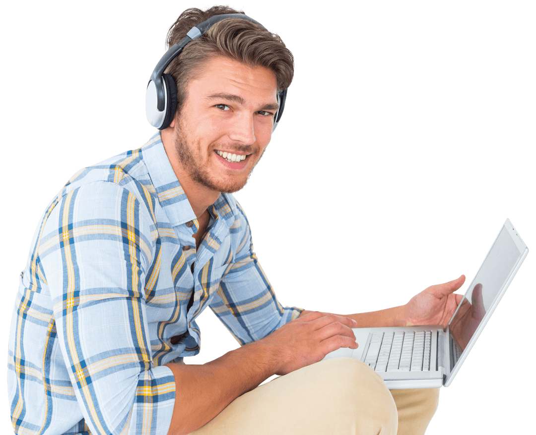 Smiling Caucasian Man with Headphones Using Laptop on Transparent Background