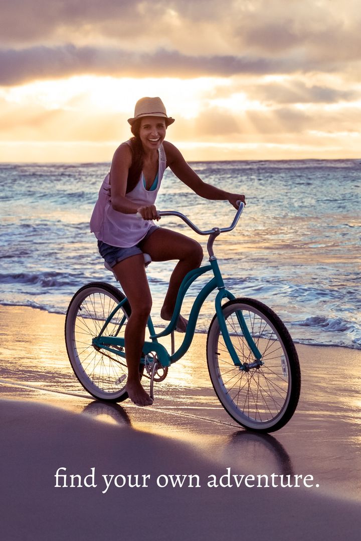 Woman Enjoys Sunset Beach Ride on Bicycle