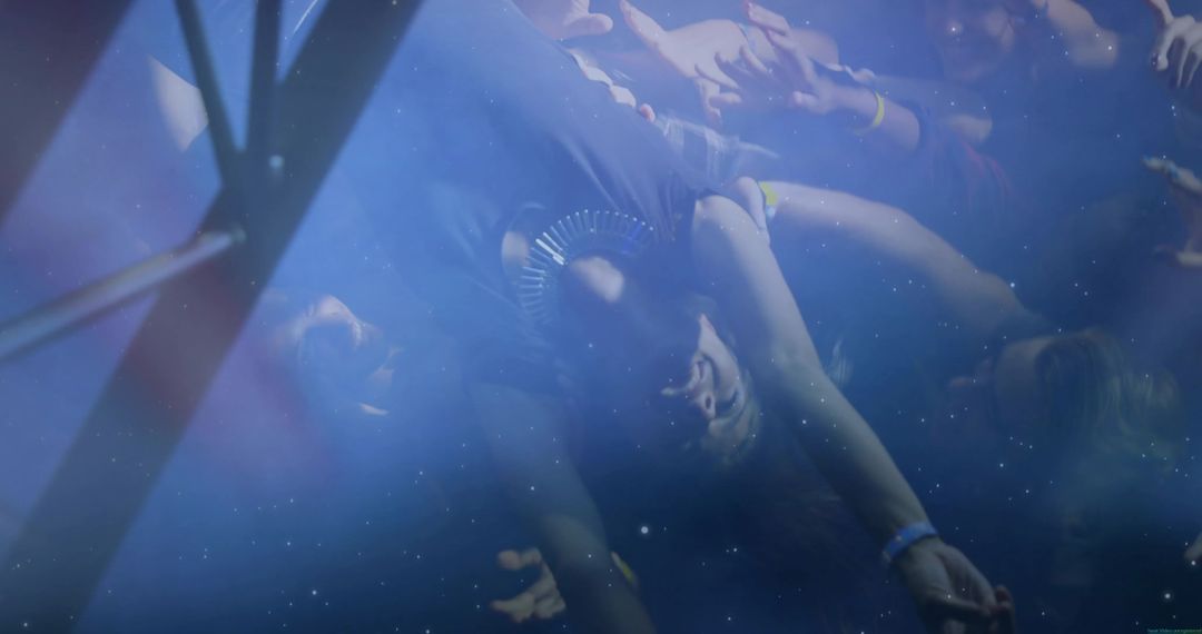 Energetic Crowd Surfing Experience at Live Music Event