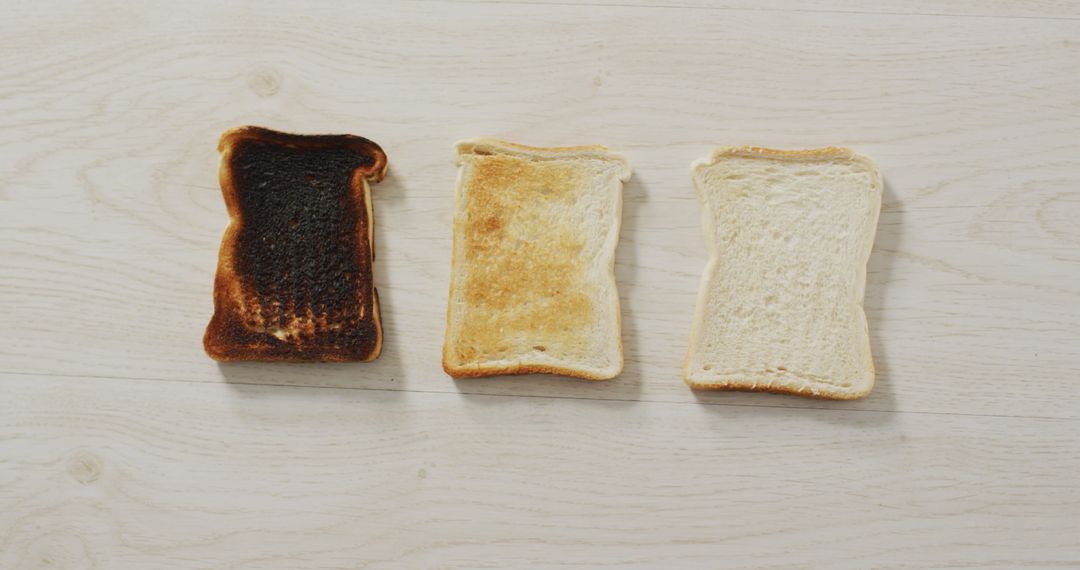 Variety of Toasts on Wooden Surface Depicting Cooking Stages