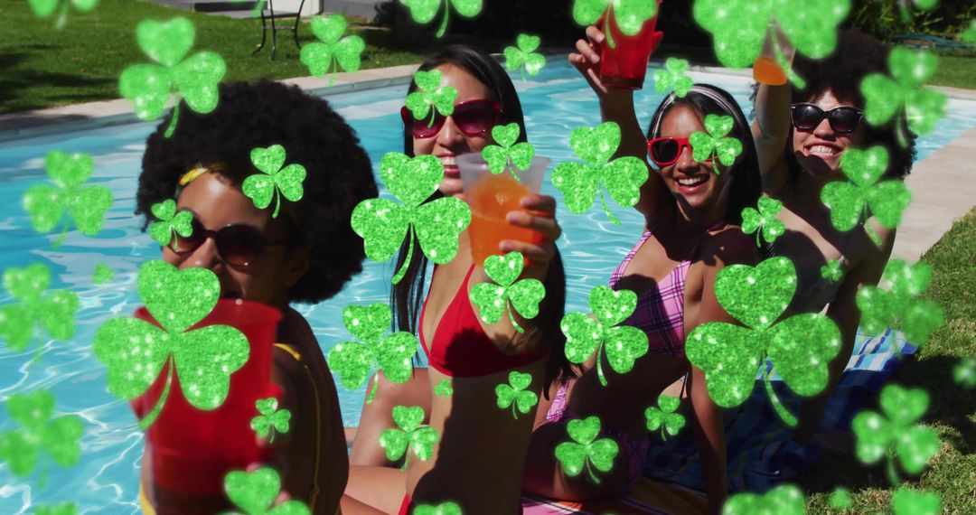 Holding drinks and cheering at backyard pool party with festive shamrock overlay