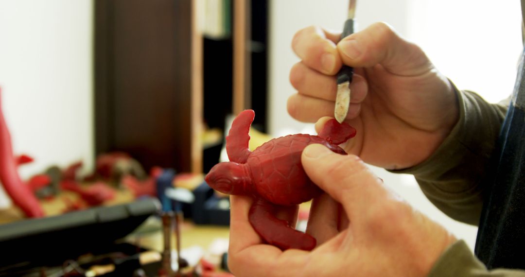 Person Carving a Small Turtle Sculpture with Precision - Free Images, Stock Photos and Pictures on Pikwizard.com