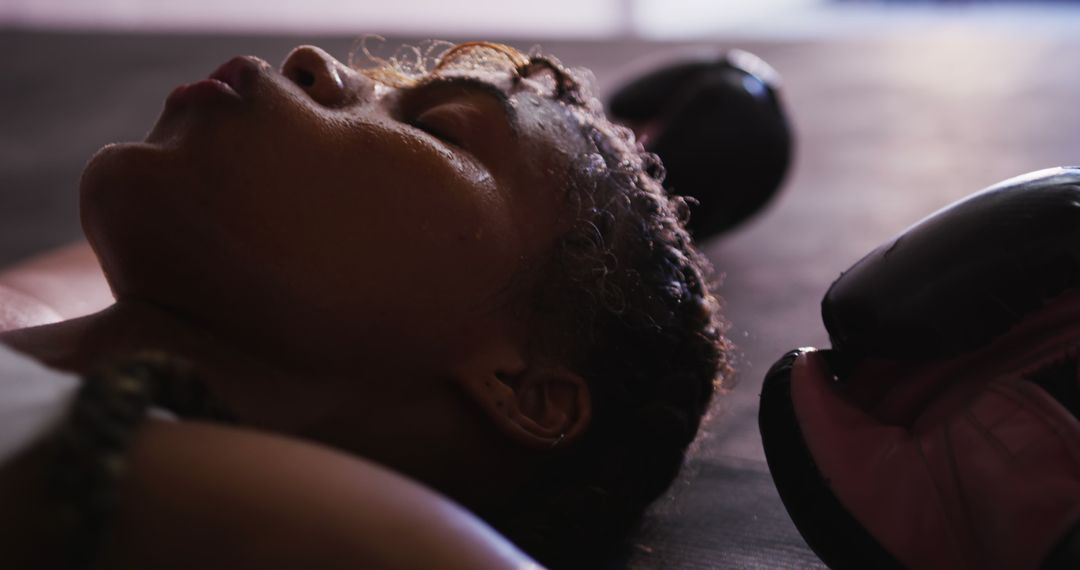 Exhausted Female Boxer Resting After Intense Training - Free Images, Stock Photos and Pictures on Pikwizard.com