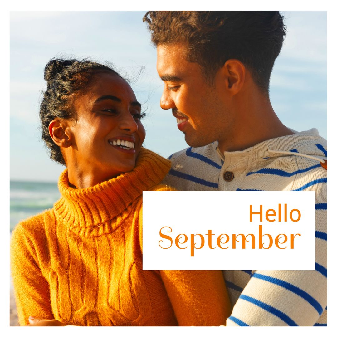 Smiling Couple at Beach Celebrating Arrival of September