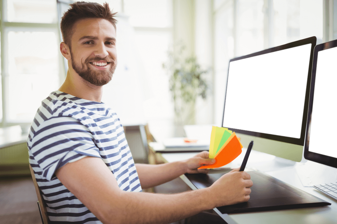 Young Entrepreneur Enjoying Creative Office Environment with Transparent Screens