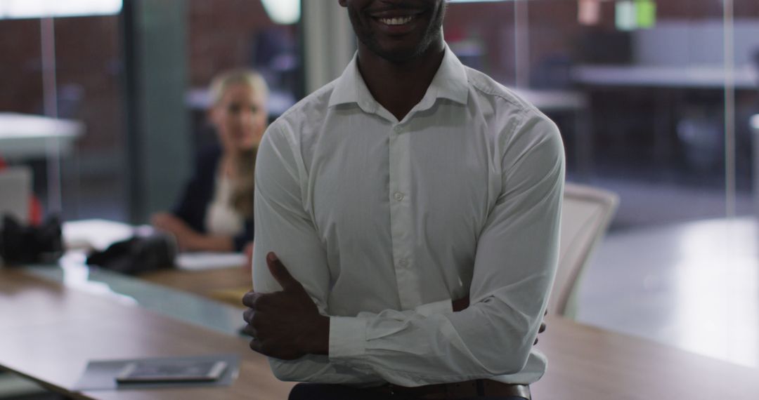 Confident African American Businessman Smiling in Modern Office Meeting Room - Free Images, Stock Photos and Pictures on Pikwizard.com