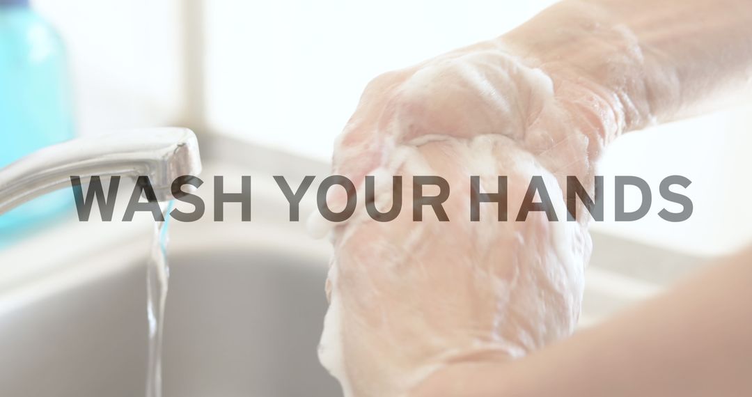 Close-up of Hands Washing with Soap Under Running Water