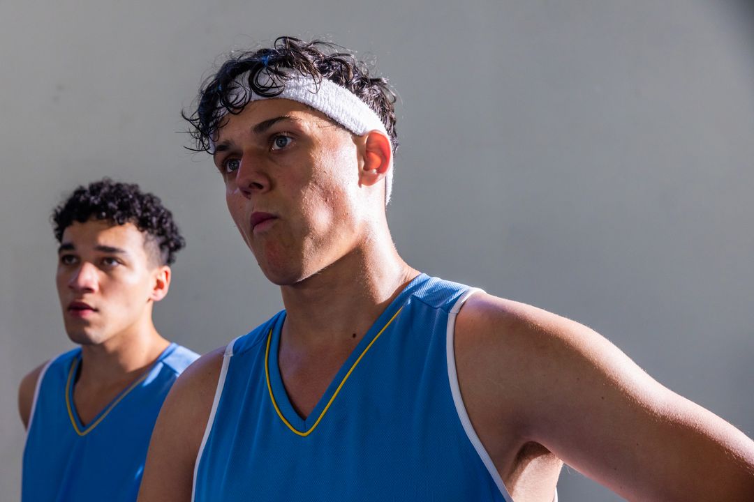 Motivated Young Athletes Standing in a Gym