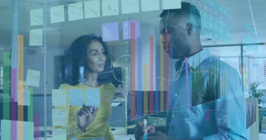 Diverse Professionals Collaborating on Data Strategy in Modern Office