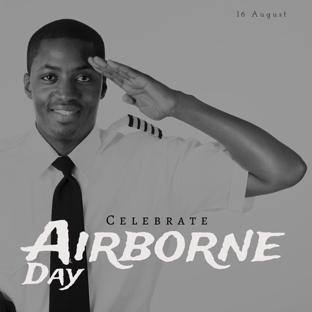 Portrait of smiling african american young male pilot saluting with celebrate airborne day text - Download Free Stock Templates Pikwizard.com