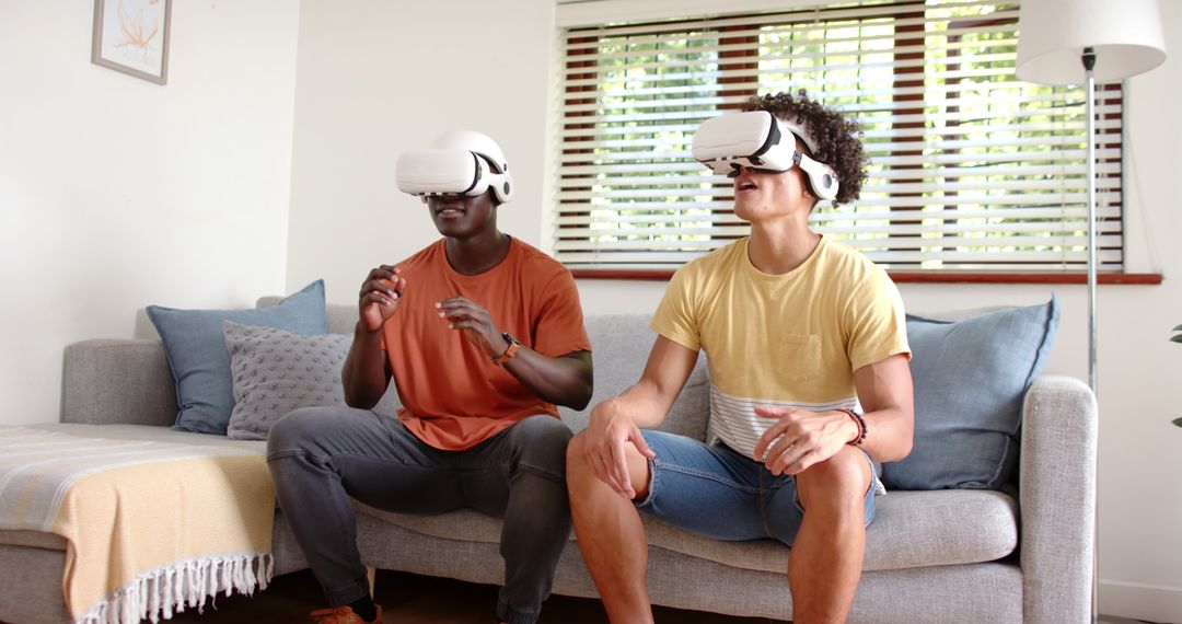 Diverse Friends Engaged in Virtual Reality Experience at Home