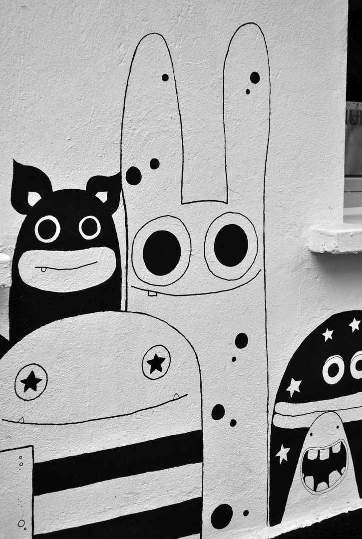Playful Black and White Street Art on Urban Wall - Free Images, Stock Photos and Pictures on Pikwizard.com